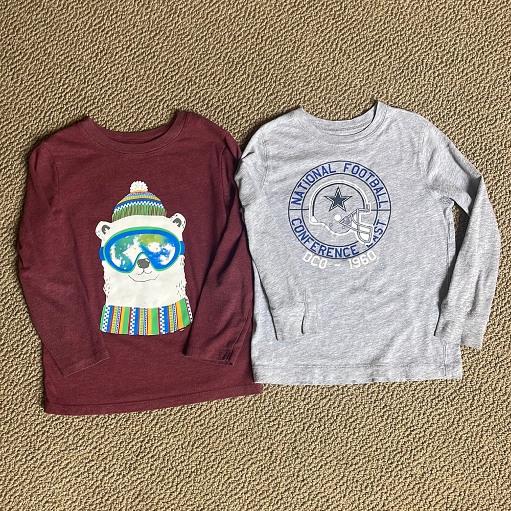 Bundle of 2 long sleeve shirts. Size 5T. Cowboy shirt has a spot on the sleeve.